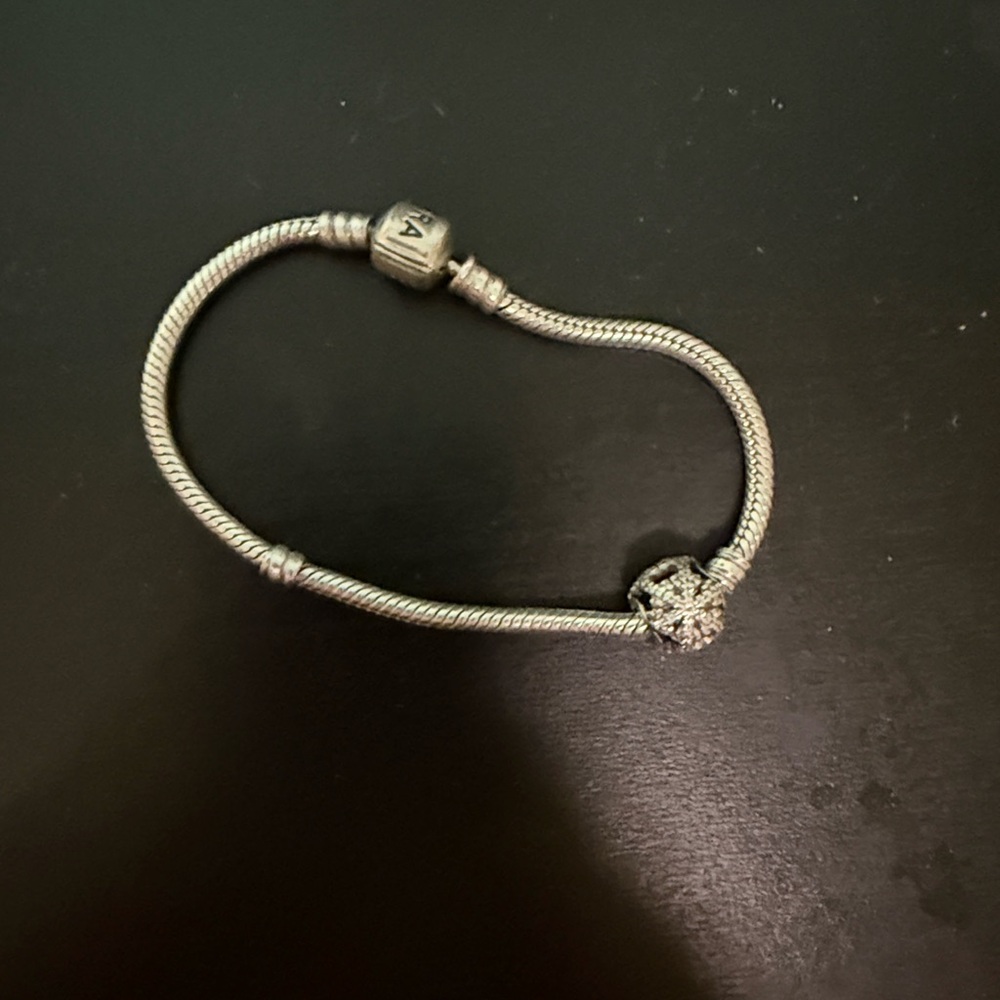 Elegant Silver Bracelet with Charm